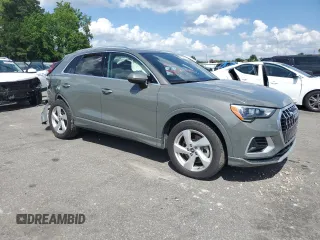 2021 Audi Q3 Premium with VIN WA1AUCF37M1067054, listed as a Copart auction lot 57299815 with 67,334 mi miles and Salvage title. Bid and sale history available at DreamBid. Image 4.
