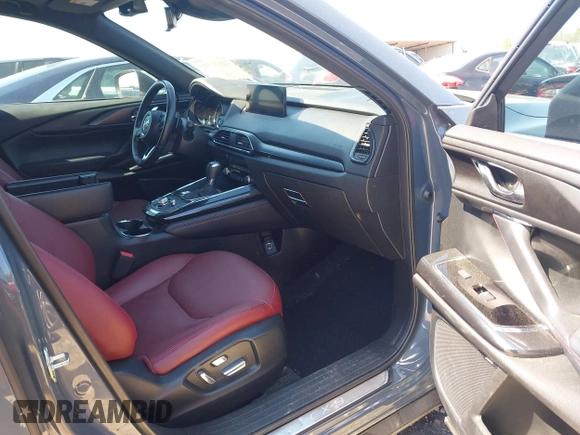 2021 Mazda CX-9 Carbon Edition with VIN JM3TCADY9M0517174, listed as a IAAI auction lot 41871485 with 48,484 mi miles and . Bid and sale history available at DreamBid. Image 5.