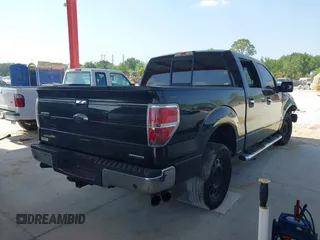 2014 Ford F-150 XL with VIN 1FTFW1CF1EFA41871, listed as a IAAI auction lot 42060338 with 134,591 mi miles. Bid and sale history available at carsss.com. Image 4.