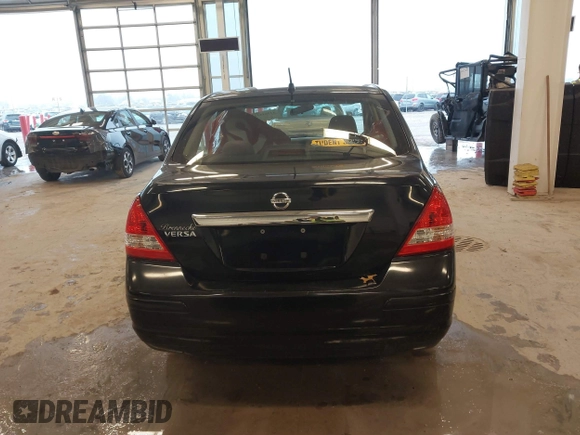 2009 Nissan Versa 1.8 S with VIN 3N1BC11E99L438342, listed as a IAAI auction lot 41561812 with 152,141 mi miles. Bid and sale history available at carsss.com. Image 17.