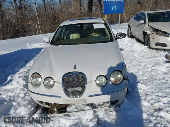 2005 Jaguar S-Type with VIN SAJWA01T75FN17656, listed as a IAAI auction lot 41282140 with 126,631 mi miles and . Bid and sale history available at DreamBid. Image 12.