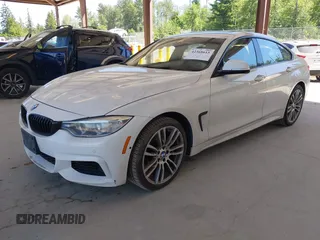 2015 BMW 4 Series 428i xDrive z VIN WBA4A7C55FD413965, wystawiony jako IAAI lot #42368615 z przebiegiem 108 308 mil mil oraz . Historia ofert i sprzedaży dostępna na DreamBid. Obrazek 2.