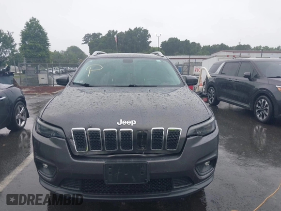 2019 Jeep Cherokee Latitude Plus with VIN 1C4PJMLB7KD195591, listed as a IAAI auction lot 42433607 with 58,370 mi miles and . Bid and sale history available at DreamBid. Image 12.