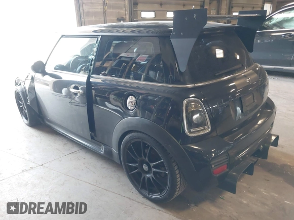 2008 MINI Hardtop S with VIN WMWMF73568TT87273, listed as a IAAI auction lot 41996859 with 107,671 mi miles and . Bid and sale history available at DreamBid. Image 3.