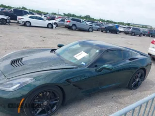 2014 Chevrolet Corvette Z51 2LT z VIN 1G1YK2D75E5104938, wystawiony jako IAAI lot #42168651 z przebiegiem 152 471 mil mil oraz . Historia ofert i sprzedaży dostępna na DreamBid. Obrazek 14.