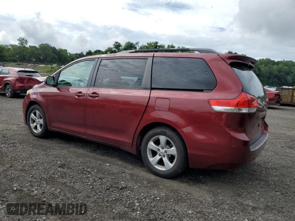 2012 Toyota Sienna LE AAS with VIN 5TDKK3DC4CS253719, listed as a Copart auction lot 63990175 with 155,561 mi miles and Salvage title. Bid and sale history available at DreamBid. Image 2.