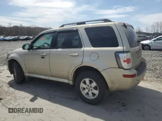 2010 Mercury Mariner z VIN 4M2CN9BG0AKJ17705, wystawiony jako Copart lot #53790315 z przebiegiem 154 832 mil mil oraz Szkody całkowita. Historia ofert i sprzedaży dostępna na DreamBid. Obrazek 2.