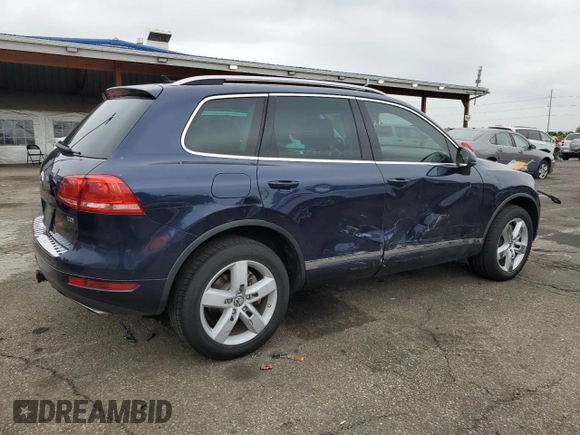 2011 Volkswagen Touareg Lux z VIN WVGFK9BP4BD001551, wystawiony jako Copart lot #58743065 z przebiegiem 142 661 mil mil oraz Szkoda całkowita • Salvage title. Historia ofert i sprzedaży dostępna na DreamBid. Obrazek 3.