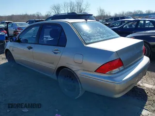 2002 Mitsubishi Lancer ES with VIN JA3AJ26E52U022764, listed as a IAAI auction lot 41763763 with 120,493 mi miles. Bid and sale history available at carsss.com. Image 3.