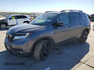 2021 Honda Passport Elite with VIN 5FNYF8H04MB034700, listed as a Copart auction lot 80916854 with 74,700 mi miles and Salvage Title. Bid and sale history available at carsss.com. Image 1.