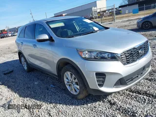 2019 Kia Sorento L z VIN 5XYPG4A36KG583391, wystawiony jako IAAI lot #41489144 z przebiegiem 77 926 mil mil oraz . Historia ofert i sprzedaży dostępna na DreamBid. Obrazek 1.