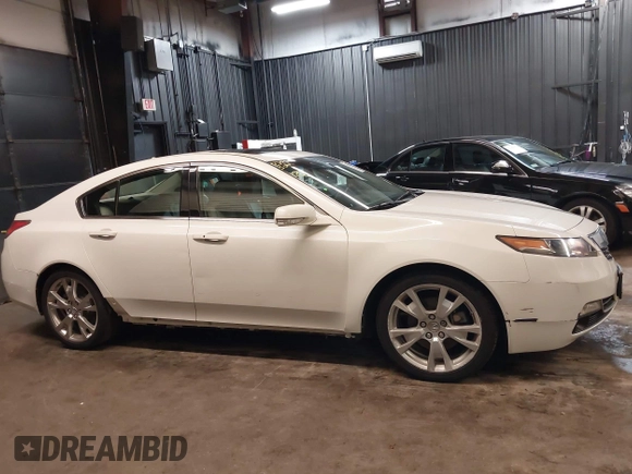 2013 Acura TL Advance z VIN 19UUA9F74DA003069, wystawiony jako IAAI lot #42281080 z przebiegiem 62 521 mil mil oraz . Historia ofert i sprzedaży dostępna na DreamBid. Obrazek 6.