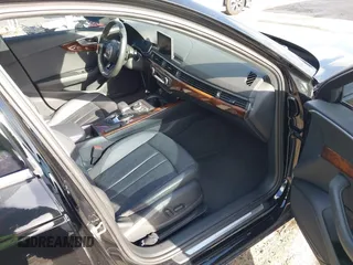 2019 Audi A4 Premium z VIN WAUGMAF45KN008083, wystawiony jako IAAI lot #41962385 z przebiegiem Nie podano mil oraz . Historia ofert i sprzedaży dostępna na DreamBid. Obrazek 5.