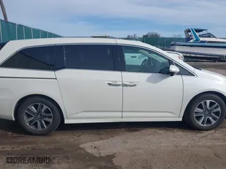 2015 Honda Odyssey Touring Elite with VIN 5FNRL5H9XFB121921, listed as a IAAI auction lot 41858551 with 61,506 mi miles. Bid and sale history available at carsss.com. Image 13.