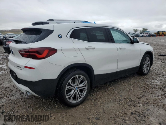 2022 BMW X2 xDrive28i z VIN WBXYJ1C00N5U17584, wystawiony jako Copart lot #55994955 z przebiegiem 21 973 mil mil oraz Czysty tytuł • Clean title. Historia ofert i sprzedaży dostępna na DreamBid. Obrazek 3.