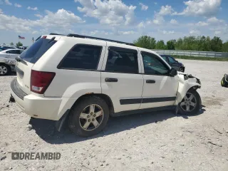 2005 Jeep Grand Cherokee Laredo with VIN 1J4GR48K05C625144, listed as a Copart auction lot 57477275 with 167,654 mi miles and Salvage title. Bid and sale history available at DreamBid. Image 3.