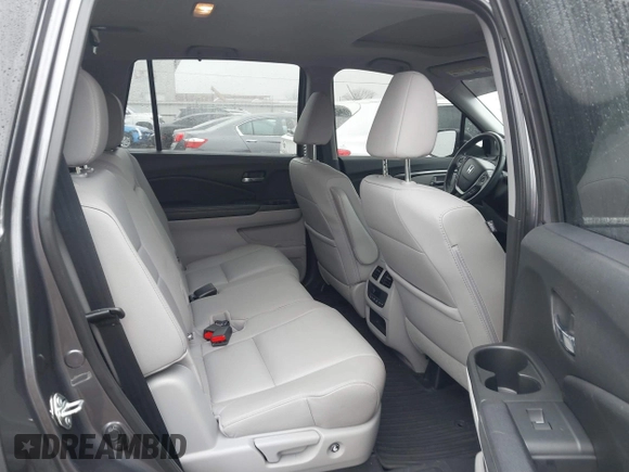 2017 Honda Pilot EX-L with VIN 5FNYF6H55HB063063, listed as a IAAI auction lot 41491193 with 75,444 mi miles and . Bid and sale history available at DreamBid. Image 8.
