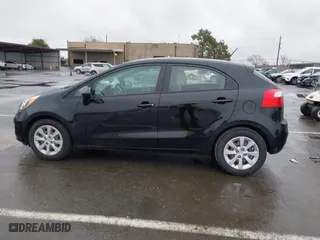 2013 Kia Rio LX with VIN KNADM5A35D6302623, listed as a IAAI auction lot 41626083 with 114,132 mi miles. Bid and sale history available at carsss.com. Image 14.