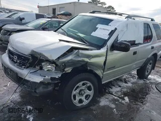 2001 Honda Passport LX z VIN 4S6CK58W014401073, wystawiony jako IAAI lot #41380551 z przebiegiem 259 878 mil mil oraz . Historia ofert i sprzedaży dostępna na DreamBid. Obrazek 2.