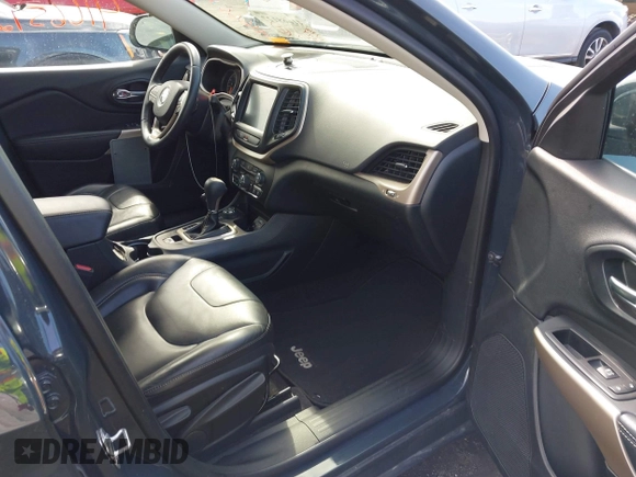 2018 Jeep Cherokee Limited with VIN 1C4PJMDB0JD569732, listed as a IAAI auction lot 41665127 with 55,412 mi miles. Bid and sale history available at carsss.com. Image 5.
