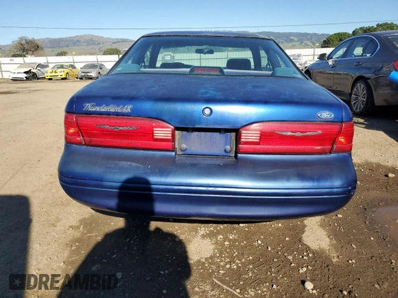 1997 Ford Thunderbird LX with VIN 1FALP6247VH129234, listed as a Copart auction lot 47096335 with 101,461 mi miles and Clean Title. Bid and sale history available at DreamBid. Image 6.