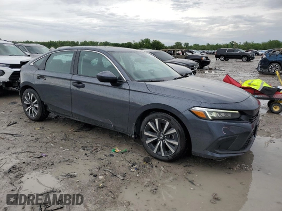 2023 Honda Civic EX z VIN 2HGFE1F78PH308112, wystawiony jako Copart lot #54184645 z przebiegiem 113 024 mil mil oraz Szkoda całkowita • Salvage title. Historia ofert i sprzedaży dostępna na DreamBid. Obrazek 4.