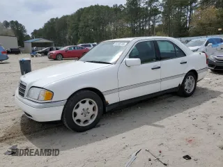 1997 Mercedes-Benz C 230/260/280/320 with VIN WDBHA28E6VA514172, listed as a Copart auction lot 54156745 with 157,074 mi miles and Salvage title. Bid and sale history available at DreamBid. Image 1.