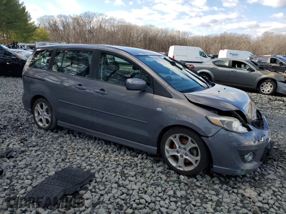 2009 Mazda 5 Sport with VIN JM1CR29L090358157, listed as a Copart auction lot 87040574 with 197,223 mi miles and Salvage title. Bid and sale history available at DreamBid. Image 4.