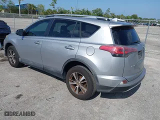 2016 Toyota RAV4 XLE with VIN 2T3WFREV7GW280362, listed as a IAAI auction lot 42023972 with 160,651 mi miles. Bid and sale history available at carsss.com. Image 3.