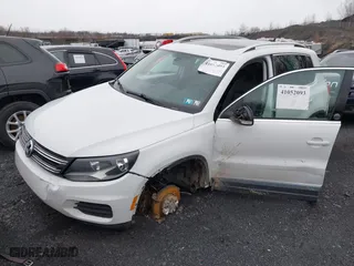 2017 Volkswagen Tiguan Wolfsburg Edition with VIN WVGSV7AXXHK003630, listed as a IAAI auction lot 41052093 with 86,509 mi miles. Bid and sale history available at carsss.com. Image 17.