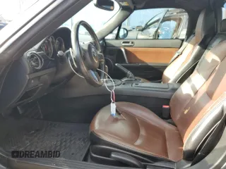 2015 Mazda MX-5 Miata Grand Touring z VIN JM1NC2PF3F0239991, wystawiony jako Copart lot #46989165 z przebiegiem 139 801 mil mil oraz Szkoda całkowita • Salvage title. Historia ofert i sprzedaży dostępna na DreamBid. Obrazek 7.