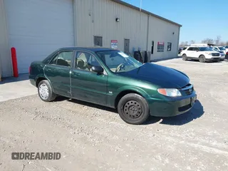 2001 Mazda Protege LX with VIN JM1BJ225310404647, listed as a IAAI auction lot 41480466 with 115,606 mi miles and . Bid and sale history available at carsss.com. Image 1.