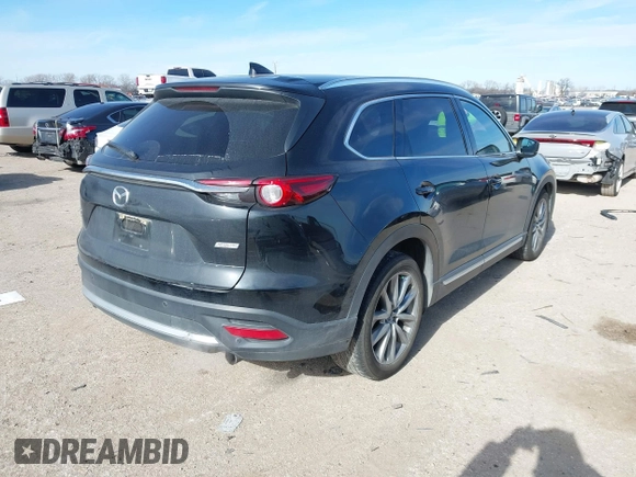 2017 Mazda CX-9 Grand Touring with VIN JM3TCBDYXH0131388, listed as a IAAI auction lot 41252943 with 61,027 mi miles. Bid and sale history available at carsss.com. Image 4.