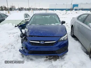 2023 Subaru Impreza with VIN 4S3GKAB69P3602517, listed as a IAAI auction lot 41478940 with 33,315 mi miles and . Bid and sale history available at DreamBid. Image 12.