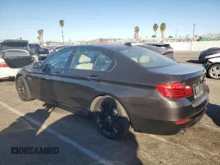 2014 BMW 5 Series 535i xDrive with VIN WBA5B3C55ED293030, listed as a Copart auction lot 80950224 with 163,016 mi miles and Salvage Title. Bid and sale history available at carsss.com. Image 2.