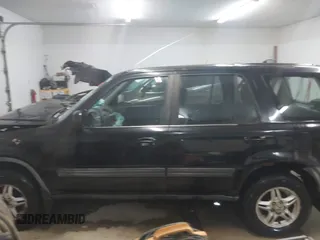 2000 Honda CR-V EX with VIN JHLRD1865YS007202, listed as a IAAI auction lot 41801108 with 134,387 mi miles. Bid and sale history available at carsss.com. Image 14.