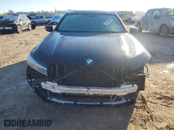 2020 BMW 7 Series 740i with VIN WBA7T2C0XLCE02429, listed as a Copart auction lot 42574835 with 73,970 mi miles and Salvage Title. Bid and sale history available at carsss.com. Image 5.