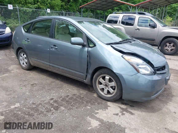 2005 Toyota Prius z VIN JTDKB20U853125464, wystawiony jako IAAI lot #42324259 z przebiegiem 166 742 mil mil oraz . Historia ofert i sprzedaży dostępna na DreamBid. Obrazek 1.