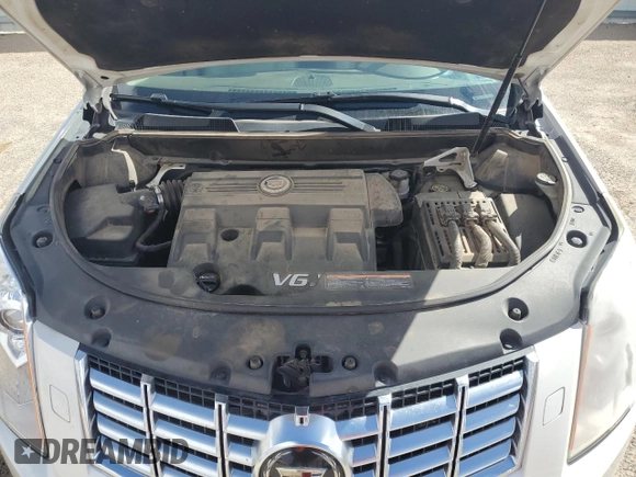 2014 Cadillac SRX Premium Collection z VIN 3GYFNGE32ES573872, wystawiony jako Copart lot #49871955 z przebiegiem 119 362 mil mil oraz Szkody całkowita. Historia ofert i sprzedaży dostępna na DreamBid. Obrazek 13.