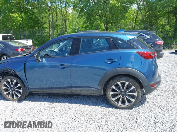 2019 Mazda CX-3 Touring z VIN JM1DKFC72K1459583, wystawiony jako IAAI lot #42380694 z przebiegiem 13 846 mil mil oraz . Historia ofert i sprzedaży dostępna na DreamBid. Obrazek 14.