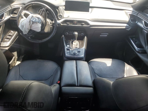 2021 Mazda CX-9 Grand Touring z VIN JM3TCADY4M0512268, wystawiony jako Copart lot #62683464 z przebiegiem Nie podano mil oraz Szkoda całkowita • Salvage title. Historia ofert i sprzedaży dostępna na DreamBid. Obrazek 8.