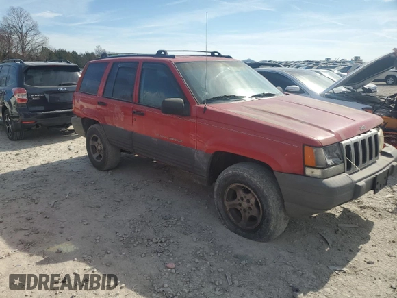 1997 Jeep Grand Cherokee Laredo with VIN 1J4GZ58S0VC501591, listed as a Copart auction lot 49289625 with 305,201 mi miles and Salvage Title. Bid and sale history available at carsss.com. Image 4.