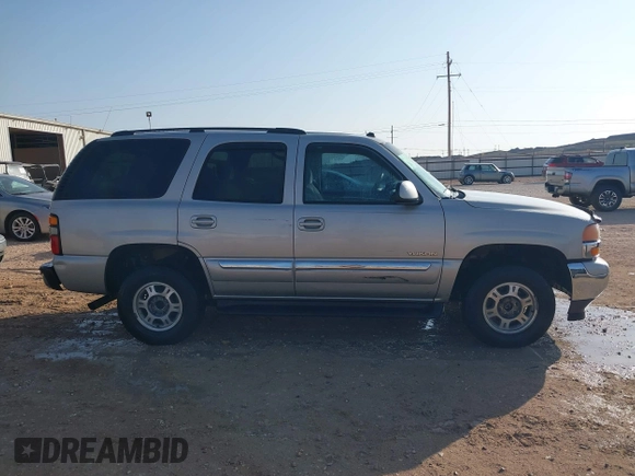 2005 GMC Yukon SLT with VIN 1GKEK13T95R203827, listed as a IAAI auction lot 41815086 with 136,671 mi miles. Bid and sale history available at carsss.com. Image 13.