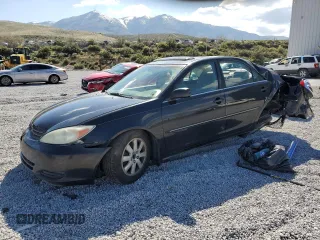 2002 Toyota Camry XLE z VIN 4T1BF30K12U020467, wystawiony jako Copart lot #54628995 z przebiegiem 222 898 mil mil oraz Szkoda całkowita • Salvage title. Historia ofert i sprzedaży dostępna na DreamBid. Obrazek 1.