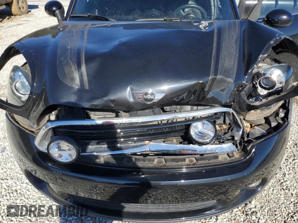 2015 MINI Countryman with VIN WMWZB3C50FWM33153, listed as a Copart auction lot 88238955 with 88,744 mi miles and Salvage Title. Bid and sale history available at DreamBid. Image 11.