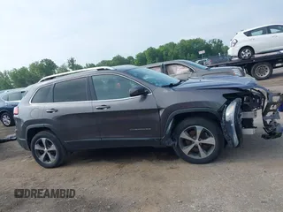 2019 Jeep Cherokee High Altitude with VIN 1C4PJMDX4KD260309, listed as a IAAI auction lot 42594817 with 63,664 mi miles and . Bid and sale history available at DreamBid. Image 14.