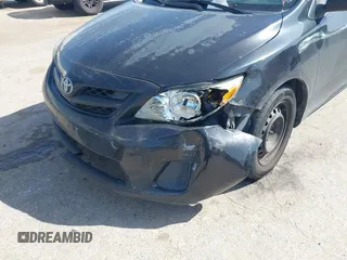 2012 Toyota Corolla L with VIN 5YFBU4EE5CP069365, listed as a IAAI auction lot 41852689 with 220,730 mi miles. Bid and sale history available at carsss.com. Image 6.