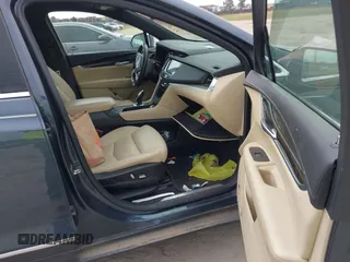 2019 Cadillac XT5 FWD with VIN 1GYKNARS5KZ220991, listed as a IAAI auction lot 41838908 with 75,730 mi miles and . Bid and sale history available at DreamBid. Image 5.