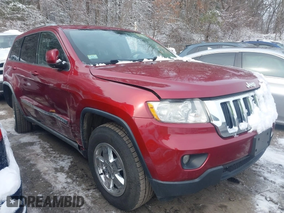 2012 Jeep Grand Cherokee Laredo with VIN 1C4RJFAGXCC174678, listed as a IAAI auction lot 41347849 with 134,156 mi miles. Bid and sale history available at carsss.com. Image 1.