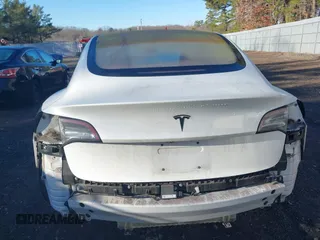 2018 Tesla Model 3 Long Range Battery with VIN 5YJ3E1EA0JF153146, listed as a IAAI auction lot 41621919 with 76,794 mi miles and . Bid and sale history available at DreamBid. Image 16.